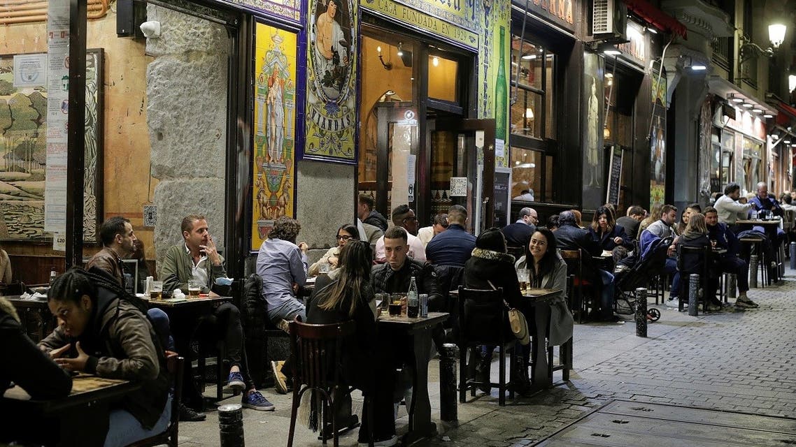 Tourists dine outdoors, as Madrid’s more relaxed COVID-19 policies attract European tourists who are escaping lockdowns due to the coronavirus, in Madrid, Spain. (Reuters)