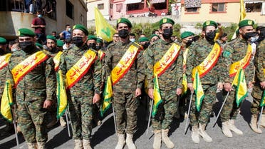 Hezbollah fighters at the funeral of Mohamed Tahan, who was killed at the border fence with Israel, in Adloun, Lebanon, May 15, 2021. (Reuters)