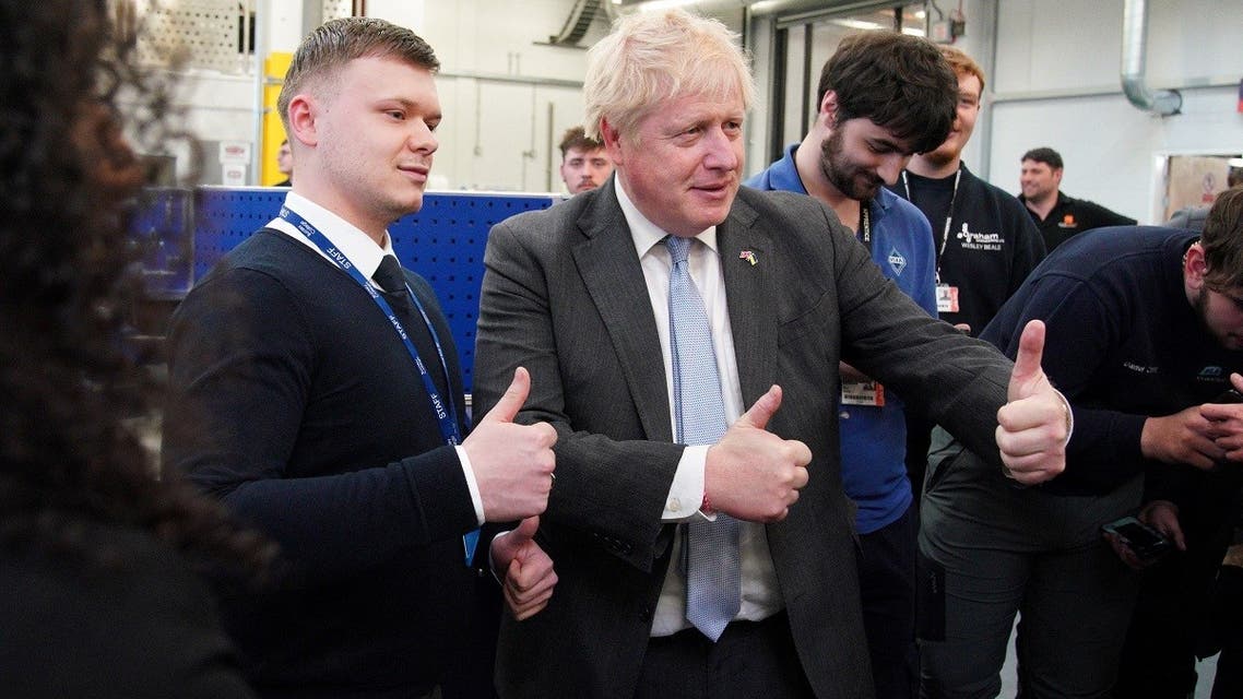 Britain’s Prime Minister Boris Johnson gestures during a campaign visit to Burnley College Sixth Form Centre in Burnley, Lancashire, Britain, on April 28, 2022. (Reuters)