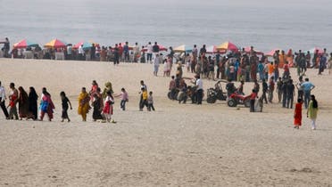Tourists visit the beach at Cox’s Bazar, believed by many to be the world's longest natural sandy stretch. (Reuters) 