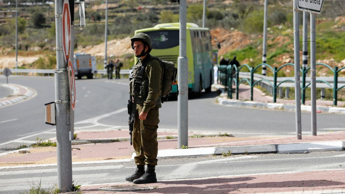 A member of the Israeli forces at the Gush Etzion settlement bloc, in the Israeli-occupied West Bank on March 31, 2022. (Reuters)