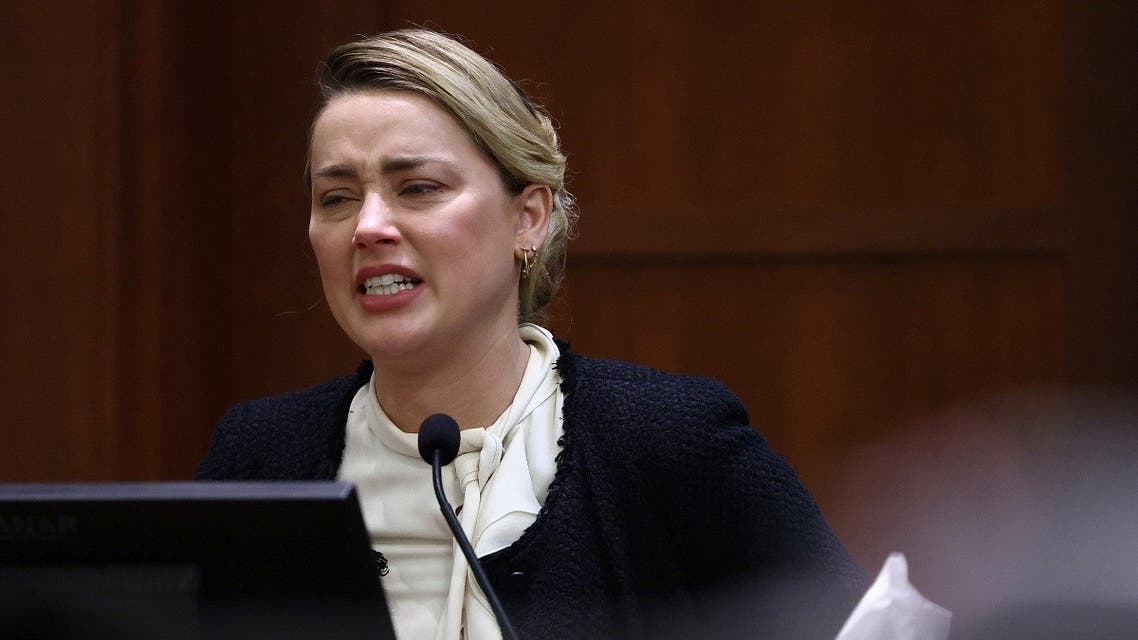 Actor Amber Heard reacts on the stand in the courtroom at Fairfax County Circuit Court during a defamation case against her by ex-husband, actor Johnny Depp in Fairfax, Virginia, US, on May 5, 2022. (Reuters)