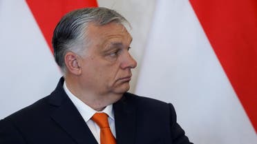Hungarian Prime Minister Viktor Orban looks on as he and Hungarian President Janos Ader give a statement to the media after their talks at the Presidential Palace in Budapest, Hungary, April 29, 2022. (Reuters)