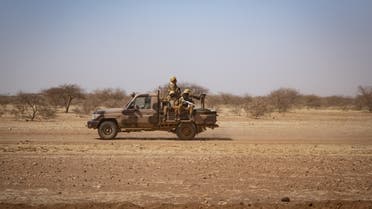 In this file photo taken on February 3, 2020 Burkina Faso soldiers patrol aboard a pick-up truck on the road from Dori to the Goudebo refugee camp. (File photo: AFP)