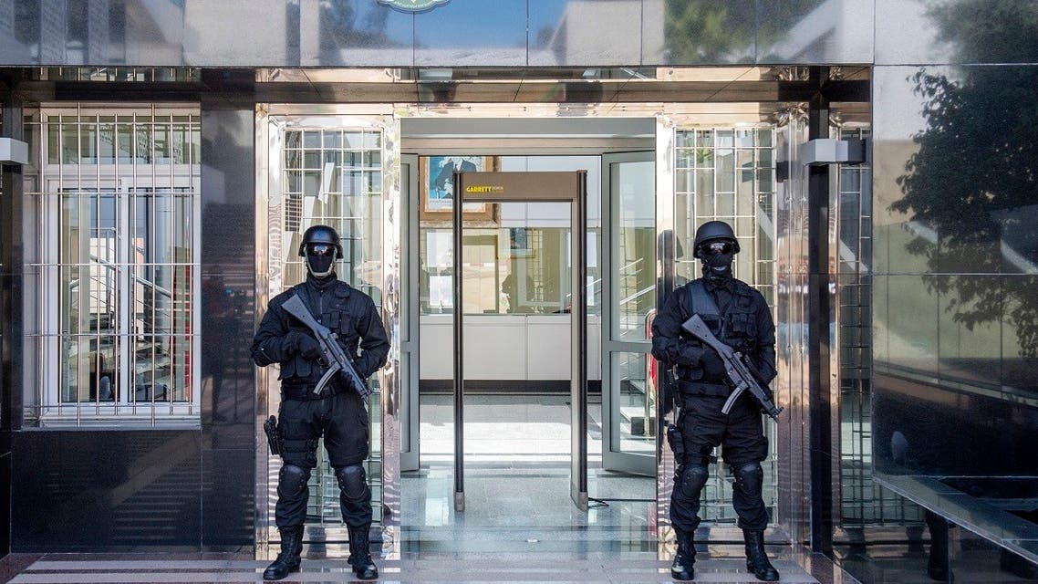 Members of Morocco’s anti-terrorism security service stand guard outside the headquarters of the Central Bureau of Judicial Investigation (BCIJ) in Sale near the capital Rabat on May 2, 2018. (AFP)