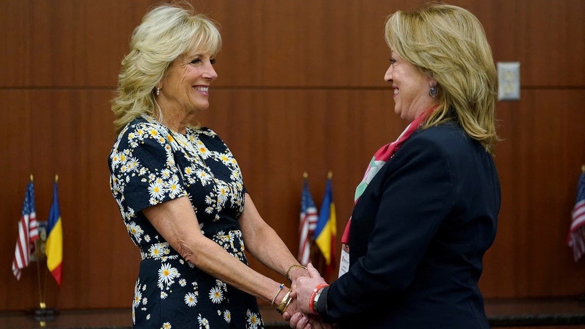 US first lady Jill Biden speaks with Save the Children Romania Chief Executive Officer Gabriela Alexandrescu before the start of a briefing on humanitarian efforts for those displaced by the war in Ukraine from United Nations agencies, NGOs, and the Romanian government during a visit to the US Embassy in Bucharest, Romania, on May 7, 2022. (Reuters)
