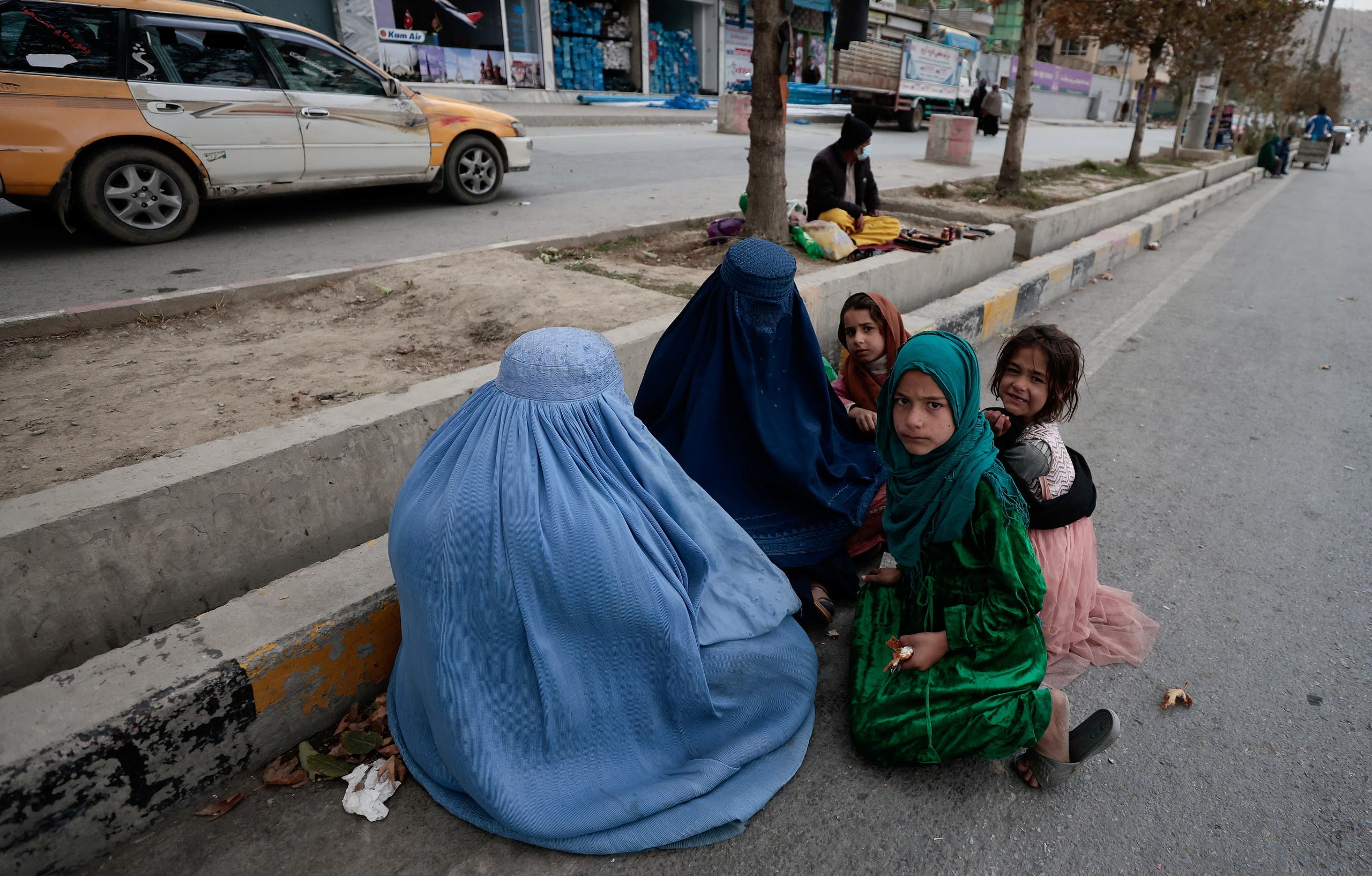 Women wearing a burqa on the streets of Kabul last October