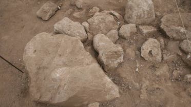 This undated photo handout on May 7, 2022 by the Italian Culture Ministry shows a side view from the west of an excavation sector with two torsos of statues of “Cavalupo-type boxers” at the Mont’e Prama archeological site in Cabras, western central Sardinia. (AFP)