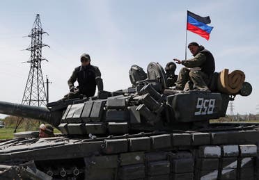 Service members of pro-Russian troops drive a tank during Ukraine-Russia conflict near Novoazovsk in the Donetsk Region, Ukraine May 6, 2022. (Reuters)