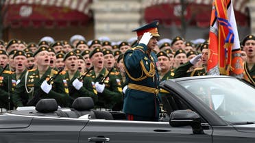 Russian Defence Minister Sergei Shoigu salutes to soldiers as he is driven along Red Square during the Victory Day military parade in Moscow on May 9, 2021. (AFP)