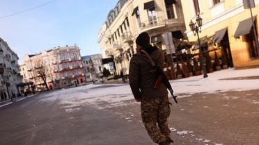 A Ukrainian military officer walks on a street, as Russia’s invasion of Ukraine continues, in downtown Odessa, Ukraine. (Reuters)