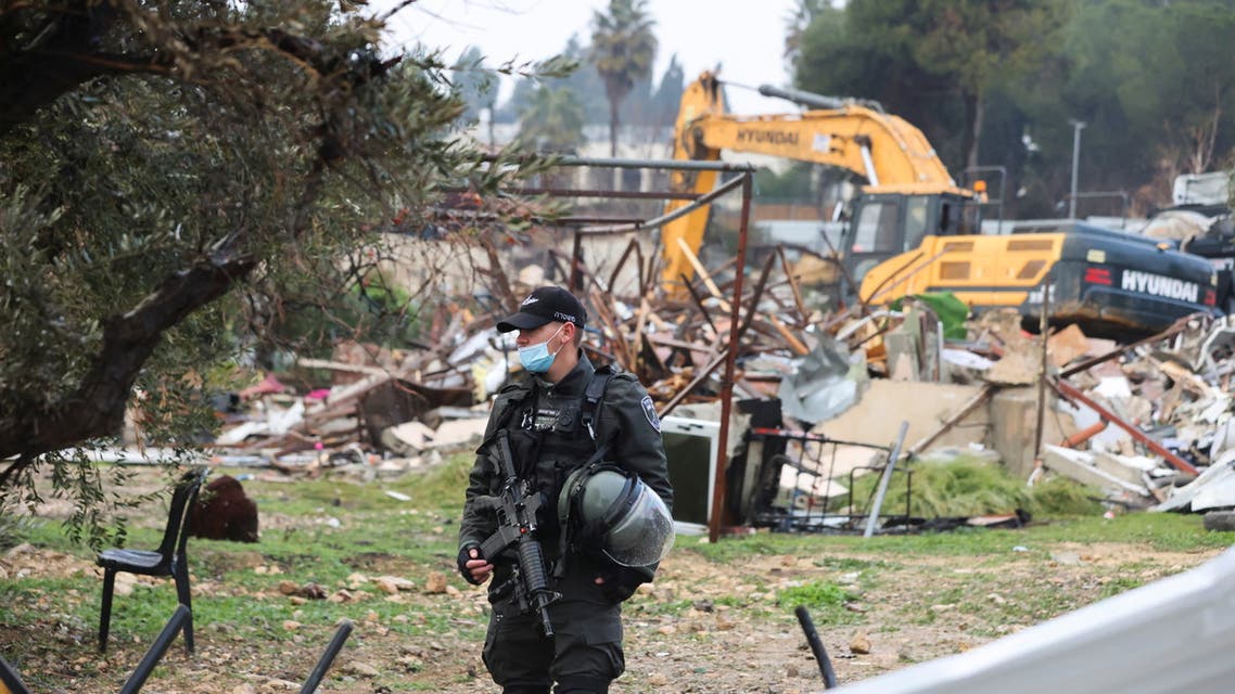 A member of the Israeli border police stands guard at the site of a demolished house in the Sheikh Jarrah neighbourhood of East Jerusalem January 19, 2022. (File photo: Reuters)