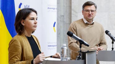 Germany’s Foreign Minister Annalena Baerbock (L) and Ukraine’s Foreign Minister Dmytro Kuleba (R) participate in a joint news conference, in Kyiv, on May 10, 2022, on the 76th day of the Russian invasion of Ukraine. (AFP)