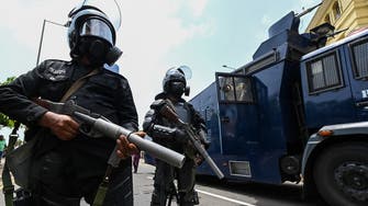 Outgoing Sri Lankan PM evacuated by troops