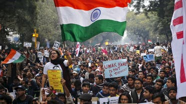 A demonstrator shouts slogans and waves the Indian national flag as she takes part in a protest demanding the release of Kanhaiya Kumar, a Jawaharlal Nehru University (JNU) student union leader accused of sedition, in New Delhi, India, February 18, 2016. (File photo: Reuters)