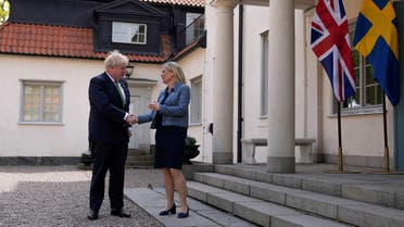 British Prime Minister Boris Johnson and Sweden's Prime Minister Magdalena Andersson meet at the Swedish Prime Minister's summer residence in Harpsund, Sweden May 11, 2022. Christine Olsson/TT News Agency/via REUTERS ATTENTION EDITORS - THIS IMAGE WAS PROVIDED BY A THIRD PARTY. SWEDEN OUT. NO COMMERCIAL OR EDITORIAL SALES IN SWEDEN.