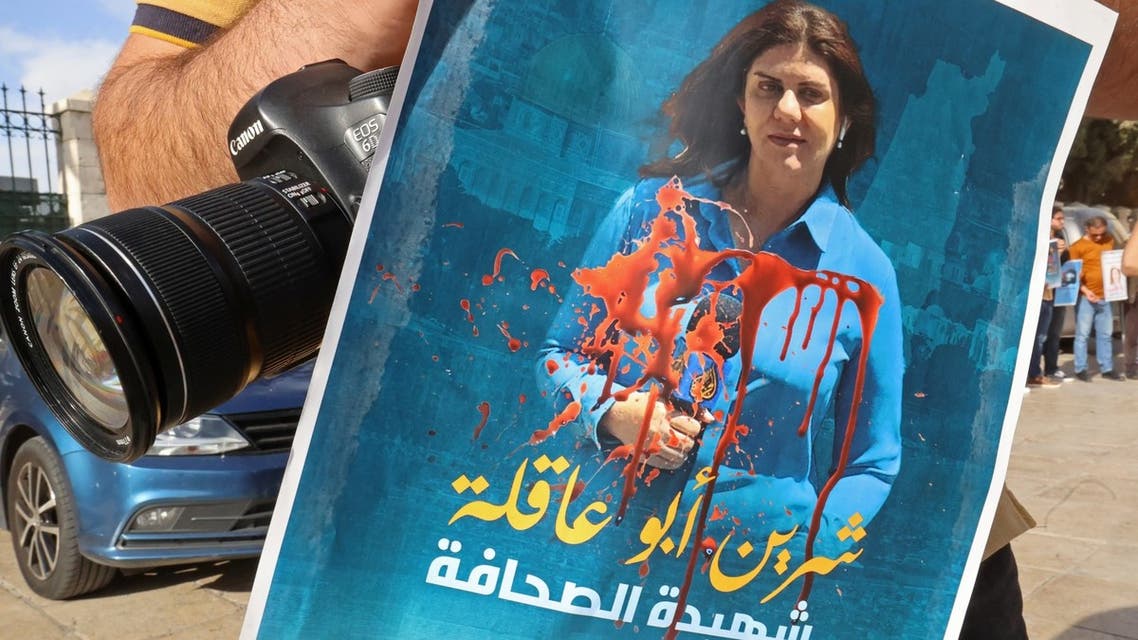 A Palestinian journalist protests the death of veteran Al-Jazeera journalist Shireen Abu Akleh, who was shot dead while covering an Israeli army raid in Jenin, in the West Bank biblical city of Bethlehem on May 11, 2022. (AFP)
