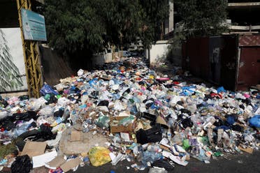 Piled up garbage is seen along a street in Ain el-Remmaneh, Lebanon September 21, 2020. (Reuters)