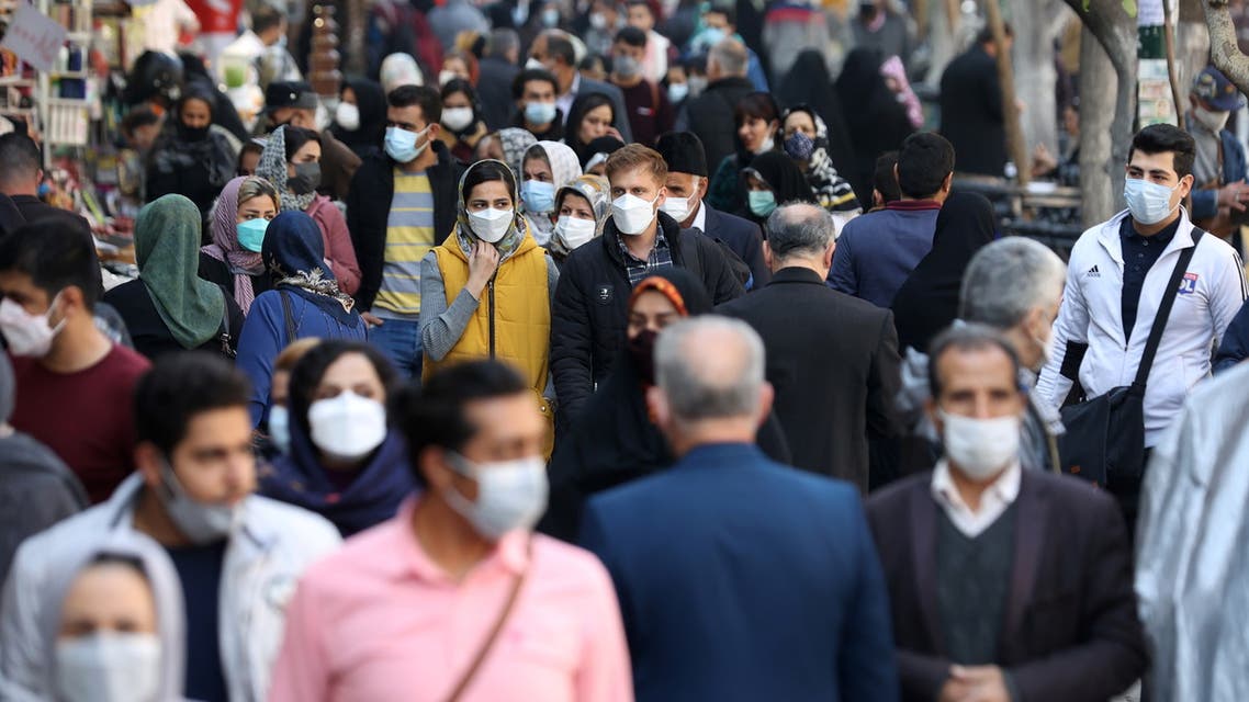 People walk at a street in Tehran, Iran, November 29, 2021. (File photo: Reuters)