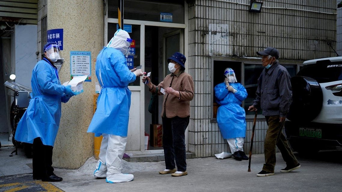 Residents line up for nucleic acid tests during lockdown, amid the coronavirus  pandemic, in Shanghai, China. (Reuters)