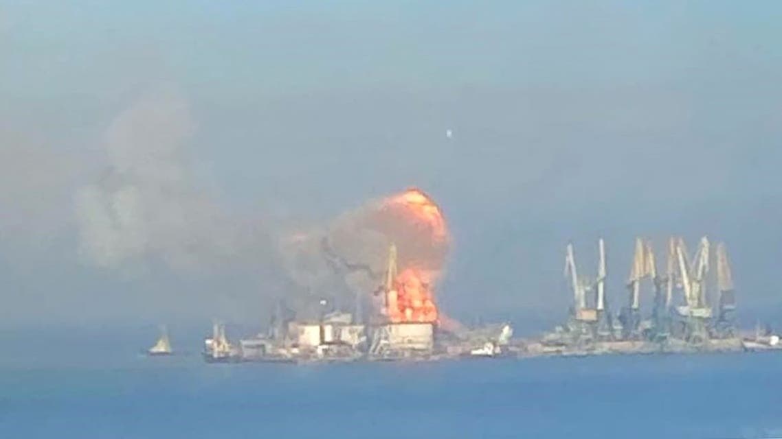 A handout picture released by the Ukrainian Navy on March 24, 2022 shows plumes of smoke and flames in the port of Berdyansk in the Azov Sea, 80 kilometres to the west of Mariupol, on the site where reportedly the large landing ship Orsk of the Russian Black Sea Fleet is docked. (File photo: AFP)