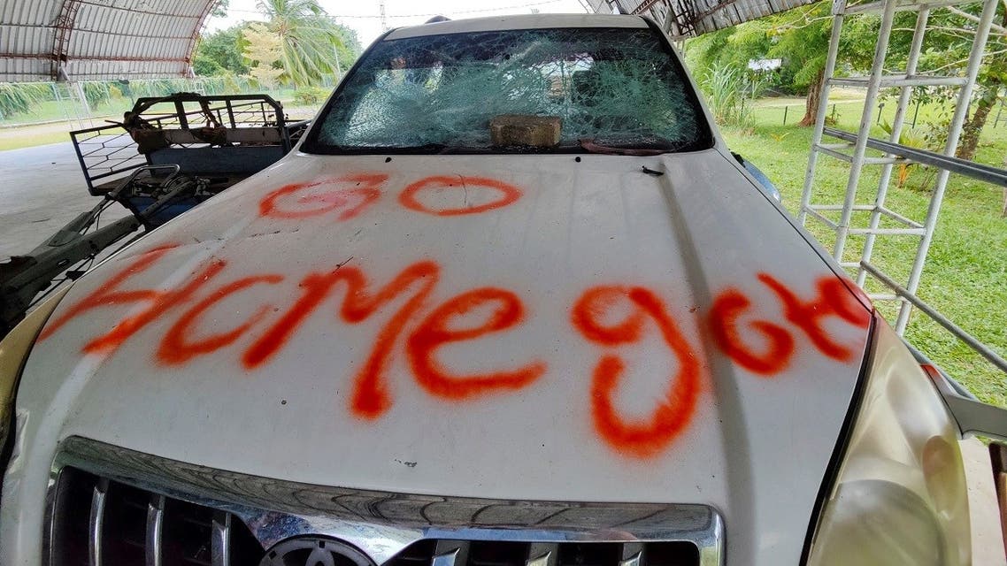 Graffiti written by anti-government factions is pictured on a vehicle, at a house belonging to the former Prime Minister Mahinda Rajapaksa’s family, following violent clashes between pro and anti-government factions and police, in Weeraketiya, Sri Lanka, on May 11, 2022. (Reuters)