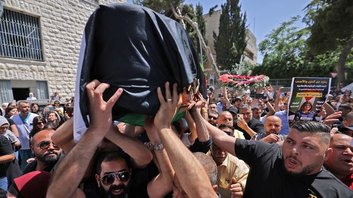 Violence erupts as Shireen Abu Akleh’s coffin emerges from Jerusalem hospital