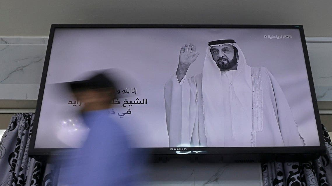 A local channel displays the portrait of late UAE President Sheikh Khalifa bin Zayed Al Nahyan, during a state mourning in Abu Dhabi on May 13, 2022. (AFP)
