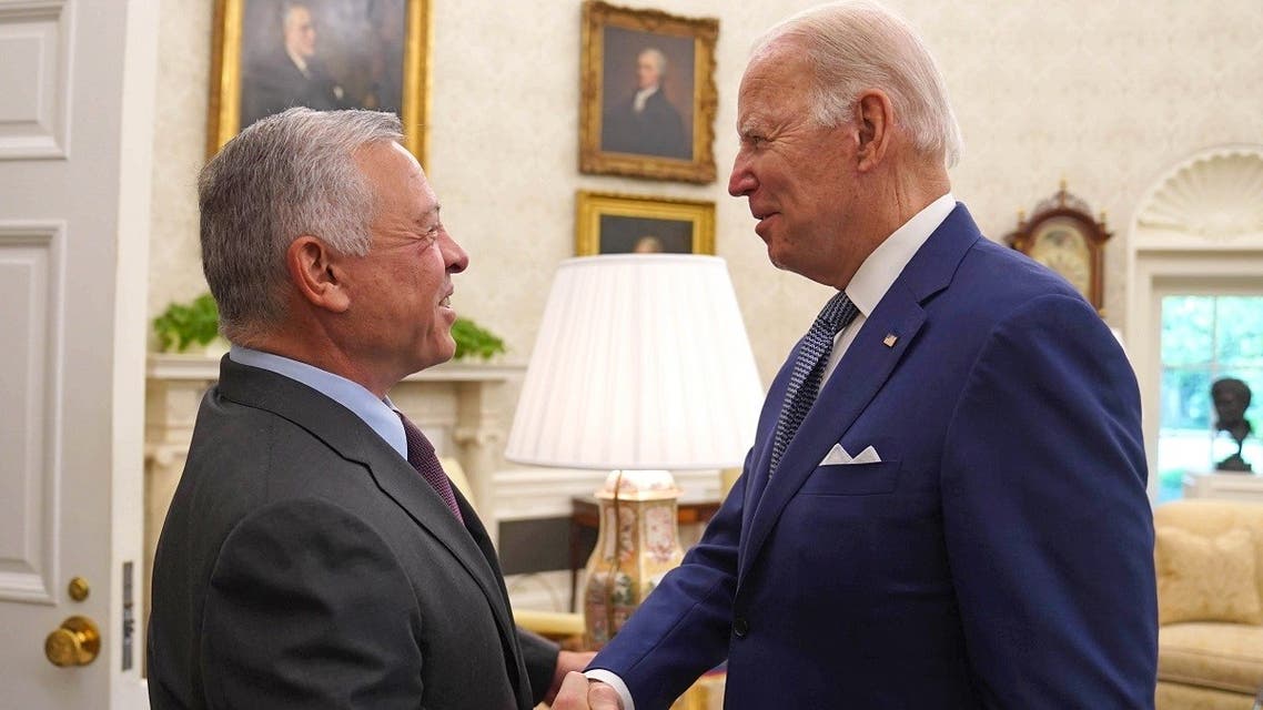 US President Joe Biden (R) receiving Jordan's King Abdullah II at the White House, May 13, 2022. (Reuters)