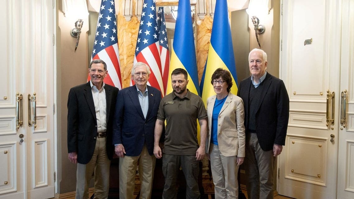 Ukraine’s President Volodymyr Zelenskyy poses for a picture with US senators in Kyiv on May 14, 2022. (Reuters)