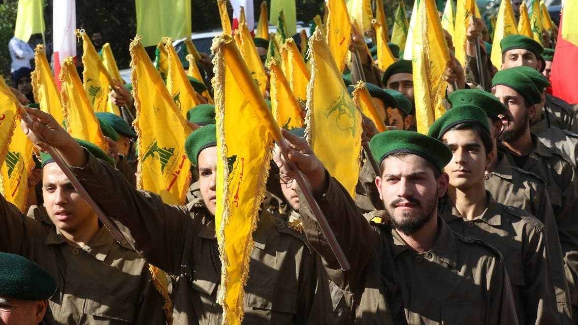 Fighters from Hezbollah take part in a military parade marking the group’s Martyrs’ Day in the southern town of Ghazieh, south of the port city of Sidon, Lebanon, on November 12, 2019. (AFP)