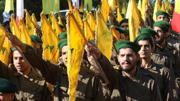 Fighters from Hezbollah take part in a military parade marking the group’s Martyrs’ Day in the southern town of Ghazieh, south of the port city of Sidon, Lebanon, on November 12, 2019. (AFP)