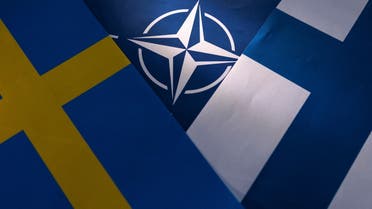 NATO, Swedish and Finnish flags are seen in this illustration taken May 12, 2022. (Reuters)
