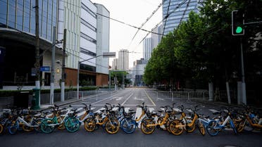 Bicycles from a bike-sharing service block a street during lockdown, amid the coronavirus disease (COVID-19) pandemic, in Shanghai, China, May 16, 2022. (Reuters)