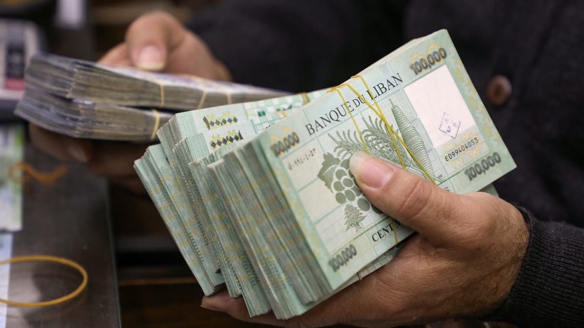 A money exchange vendor displays Lebanese pound banknotes at his shop in Beirut, Lebanon, January 5, 2022. Picture taken January 5, 2022. (File photo: Reuters)
