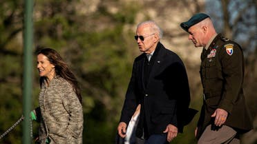 Ashley Biden, US President Joe Biden, and Col. David D. Bowling, Commander of the Joint Base Myer-Henderson Hall, walk towards the motorcade at Fort Lesley J. McNair, following Biden spending the weekend at Camp David in Maryland, in Washington, US, April 17, 2022. (Reuters)  