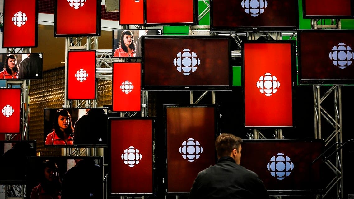 A man sits inside the Canadian Broadcast Corporation (CBC) broadcasting center in Toronto on May 23, 2014. (Reuters)
