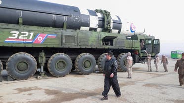 North Korean leader Kim Jong Un walks next to what state media reports is the Hwasong-17 intercontinental ballistic missile (ICBM) on its launch vehicle in this undated photo released on March 25, 2022 by North Korea's Korean Central News Agency (KCNA). (File photo: Reuters)