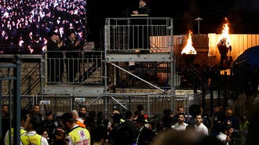 Ultra-Orthodox Jews gather at the gravesite of Rabbi Shimon Bar Yochai at Mount Meron in northern Israel May 18, 2022, as they celebrate the Jewish holiday of Lag BaOmer. (AFP)