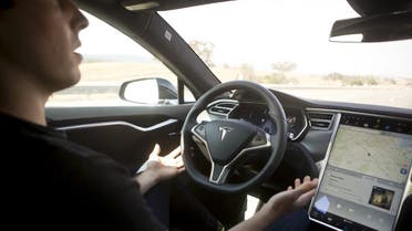New Autopilot features are demonstrated in a Tesla Model S during a Tesla event in Palo Alto, California. (Reuters)