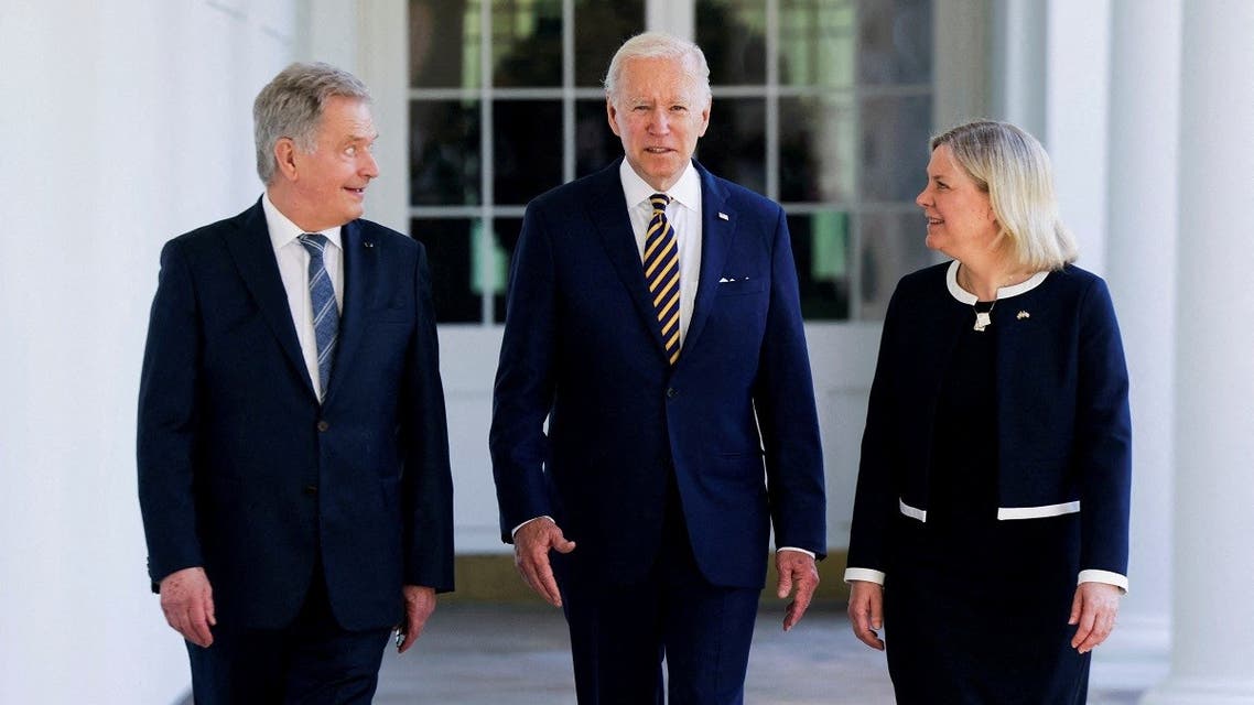 US President Joe Biden, Sweden’s Prime Minister Magdalena Andersson and Finland’s President Sauli Niinisto walk along the Colonnade to the Oval Office at the White House, in Washington, US, on May 19, 2022. (Reuters)