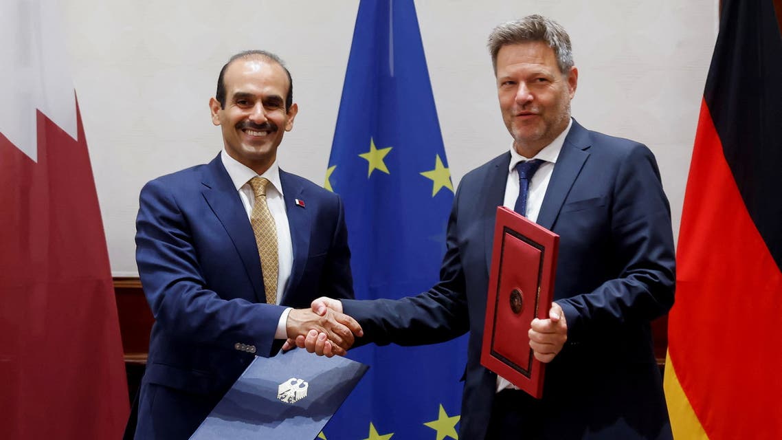 German Economy and Climate Minister Robert Habeck and Qatari Energy Minister Saad Sherida al-Kaabi shake hands as they meet to sign an agreement on the two countries' energy partnership, in Berlin, Germany, May 20, 2022. (Reuters)