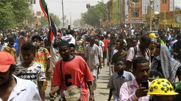 Sudanese demonstrators take to the streets of the capital Khartoum on May 19, 2022, calling for civilian rule and denouncing the military administration. (AFP)