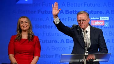 Anthony Albanese, leader of Australia's Labor Party is accompanied by his partner Jodie Haydon while he addresses his supporters after incumbent Prime Minister and Liberal Party leader Scott Morrison conceded defeat in the country's general election, in Sydney, Australia May 21, 2022. REUTERS/Jaimi Joy
