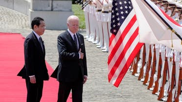 US President Joe Biden and Japanese Prime Minister Fumio Kishida review an honor guard during a welcome ceremony for President Biden, at the Akasaka Palace state guest house in Tokyo, Japan, on May 23, 2022. (Reuters)