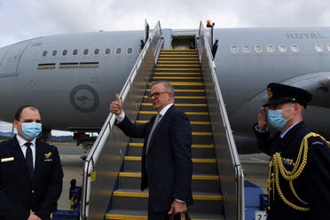 Australian Prime Minister Anthony Albanese boards the plane to Japan to attend the QUAD leaders meeting in Tokyo, in Canberra, Australia, on May 23, 2022. (Reuters)