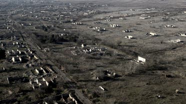  This aerial view shows ruins of the village of Zangilan, Azerbaijan, on January 5, 2021, in an area recaptured by Azerbaijan in October 2020 during a six-week war with Armenia over breakaway region of Nagorno-Karabakh. / AFP / TOFIK BABAYEV