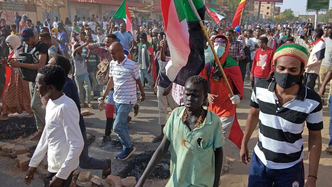 Sudanese protesters march towards the parliament building in Omdurman on April 6, 2022, during a rally against military rule. (File Photo: AFP)