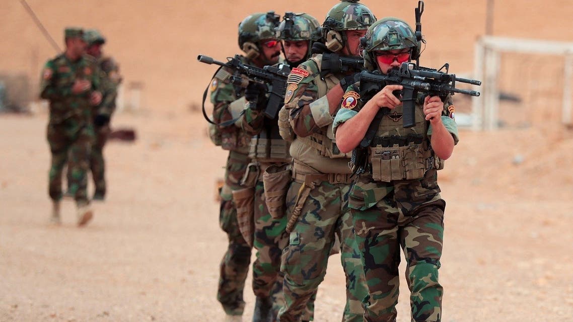 Iraqi Special Forces members participate in the “Solid Will” military operation against ISIS militants in the desert of Anbar, Iraq on April 23, 2022. (Reuters)