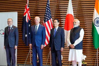 Quad leaders vow free and open Indo-Pacific, action on climate